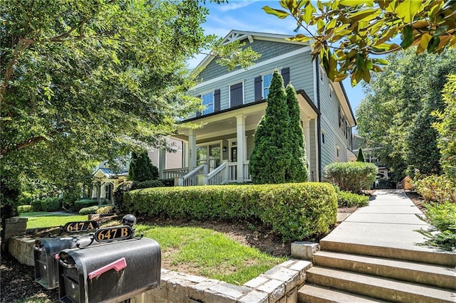 647 E Ave NE, Atlanta, GA 30312 - view of front of home featuring covered porch