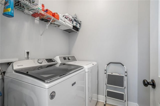 647 E Ave NE, Atlanta, GA 30312 - washroom featuring baseboards, laundry area, and washer and clothes dryer