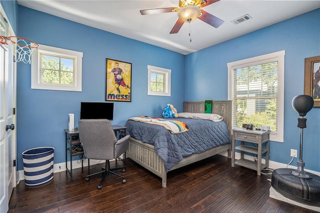 647 E Ave NE, Atlanta, GA 30312 - bedroom with visible vents, a ceiling fan, multiple windows, and hardwood / wood-style flooring