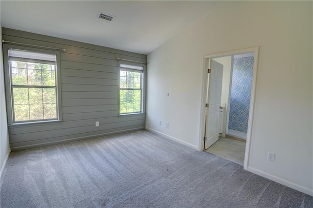 3263 Long Iron Pl, Lawrenceville, GA 30044 - spare room featuring healthy amount of natural light, carpet, and baseboards