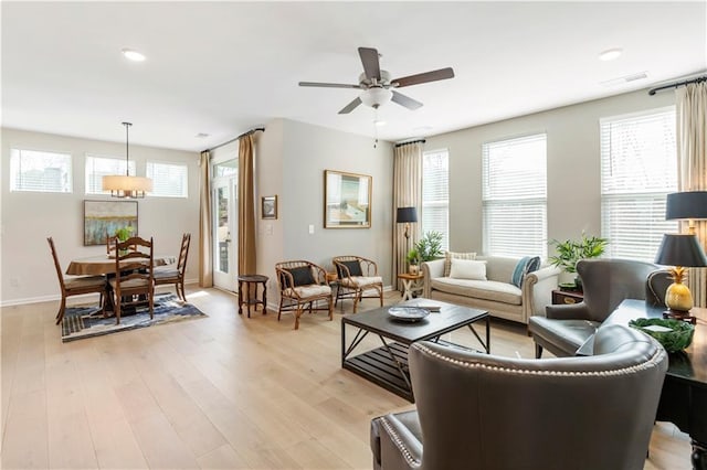 15 Lakeside Way, Cartersville, GA 30121 - living room featuring healthy amount of natural light, a ceiling fan, light wood-style floors, baseboards, and recessed lighting