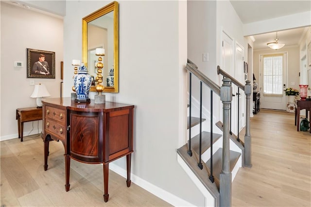 15 Lakeside Way, Cartersville, GA 30121 - foyer featuring light wood-style floors, stairs, baseboards, and crown molding