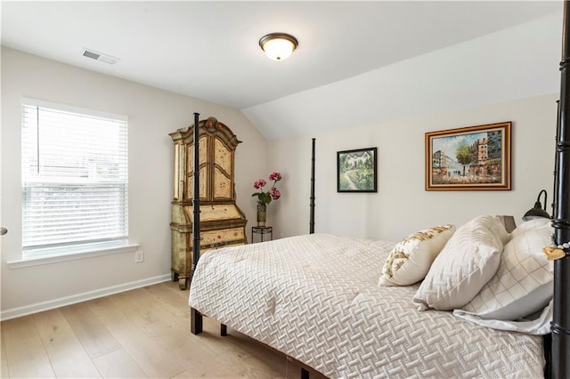 15 Lakeside Way, Cartersville, GA 30121 - bedroom featuring baseboards, light wood-type flooring, and vaulted ceiling