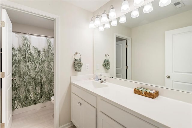15 Lakeside Way, Cartersville, GA 30121 - full bath with toilet, vanity, baseboards, and a shower with shower curtain