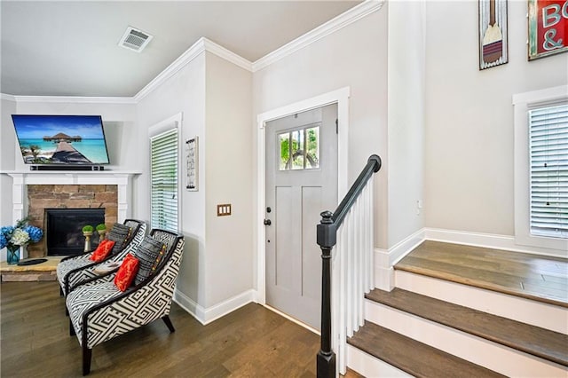 4571 Academy St, Acworth, GA 30101 - foyer featuring wood finished floors, crown molding, and a fireplace