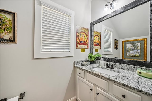 4571 Academy St, Acworth, GA 30101 - bathroom featuring vanity and lofted ceiling