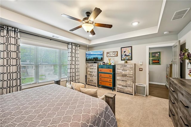 4571 Academy St, Acworth, GA 30101 - carpeted bedroom featuring a raised ceiling and a ceiling fan