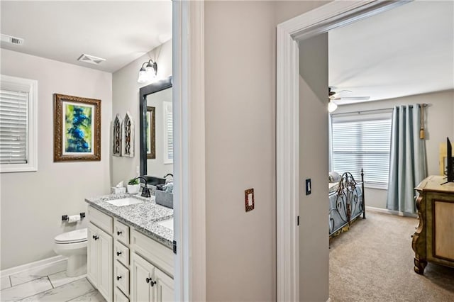 4571 Academy St, Acworth, GA 30101 - full bath featuring double vanity, a ceiling fan, and marble finish flooring