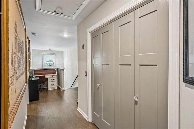 4571 Academy St, Acworth, GA 30101 - corridor featuring dark wood-style flooring, an upstairs landing, and attic access