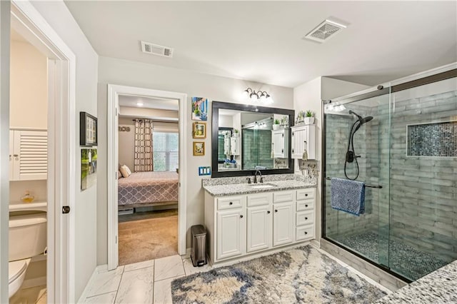 4571 Academy St, Acworth, GA 30101 - bathroom featuring vanity, marble look tiles, a shower stall, and ensuite bath