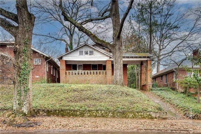 view of front of house featuring brick siding