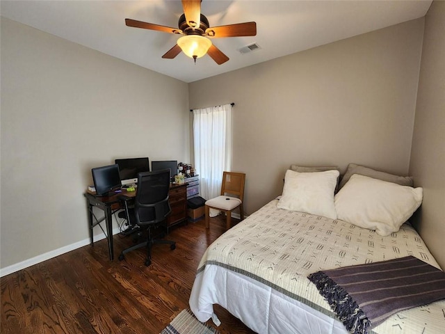 bedroom with a ceiling fan, baseboards, visible vents, and dark wood-style flooring