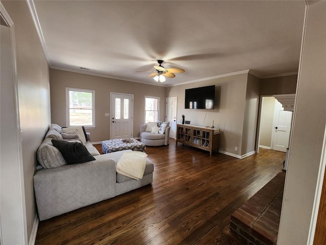 living room featuring dark wood-style floors, baseboards, a ceiling fan, and ornamental molding