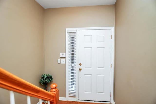 foyer with hardwood / wood-style floors