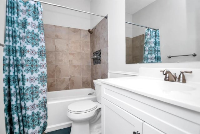 bathroom featuring vanity, toilet, and shower / tub combo with curtain