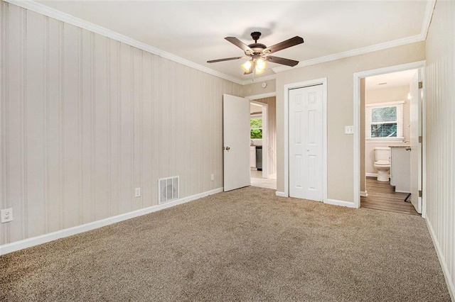 1955 Vicki Ln SE, Atlanta, GA 30316 - unfurnished bedroom with carpet floors, ornamental molding, baseboards, a closet, and ceiling fan