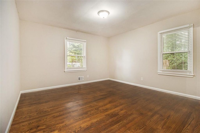 1955 Vicki Ln SE, Atlanta, GA 30316 - unfurnished room featuring baseboards and dark wood finished floors