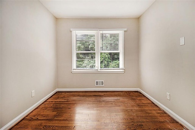 1955 Vicki Ln SE, Atlanta, GA 30316 - unfurnished room with plenty of natural light, wood finished floors, and baseboards