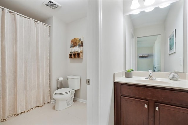 bathroom with baseboards, visible vents, toilet, tile patterned floors, and vanity