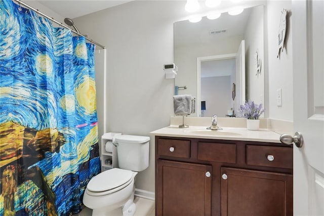 bathroom featuring toilet, curtained shower, vanity, and visible vents