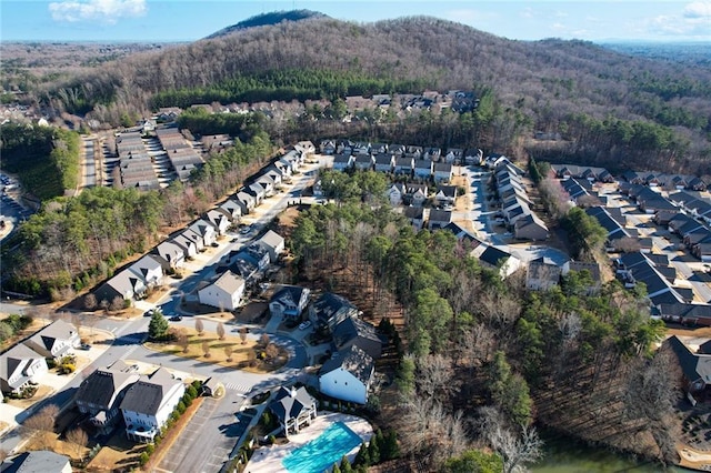 aerial view with a residential view and a view of trees