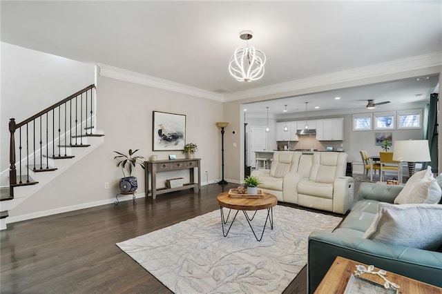 living area featuring baseboards, dark wood finished floors, stairway, crown molding, and recessed lighting