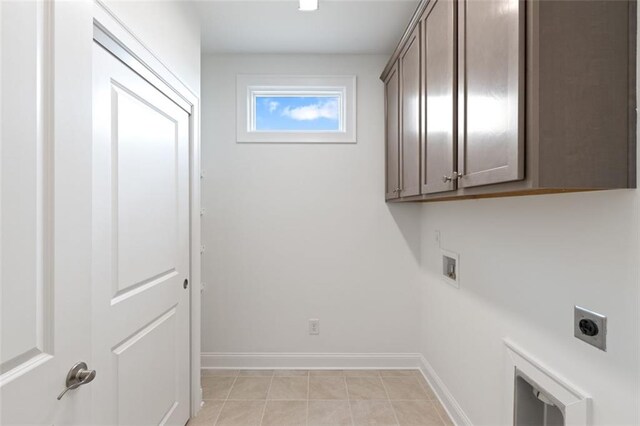 living room with baseboards, ceiling fan, built in shelves, ornamental molding, and light wood-style floors