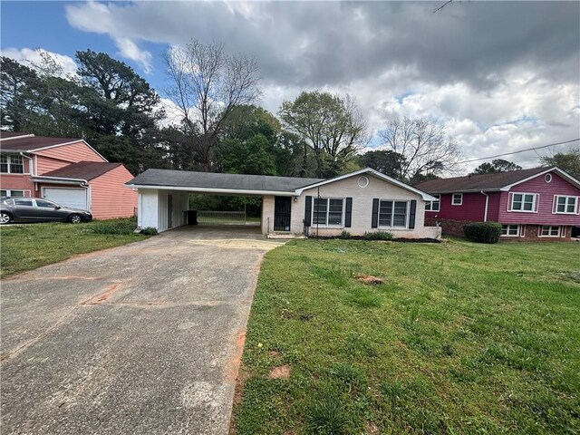 2830 Norgate Ln, Decatur, GA 30034 - ranch-style home with an attached carport, a front yard, and concrete driveway