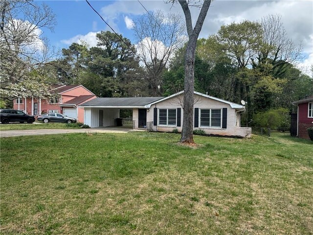2830 Norgate Ln, Decatur, GA 30034 - single story home with an attached carport, a front yard, and driveway