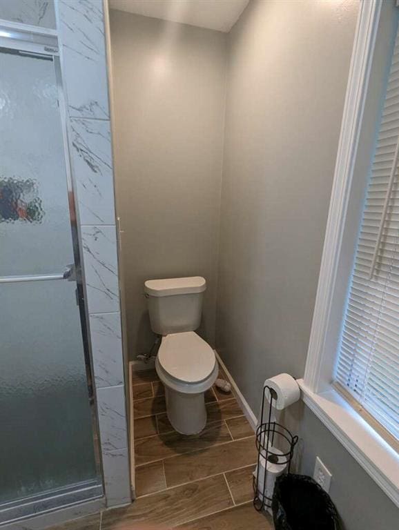 6977 Eunice Dr, Riverdale, GA 30274 - bathroom with toilet and walk in shower