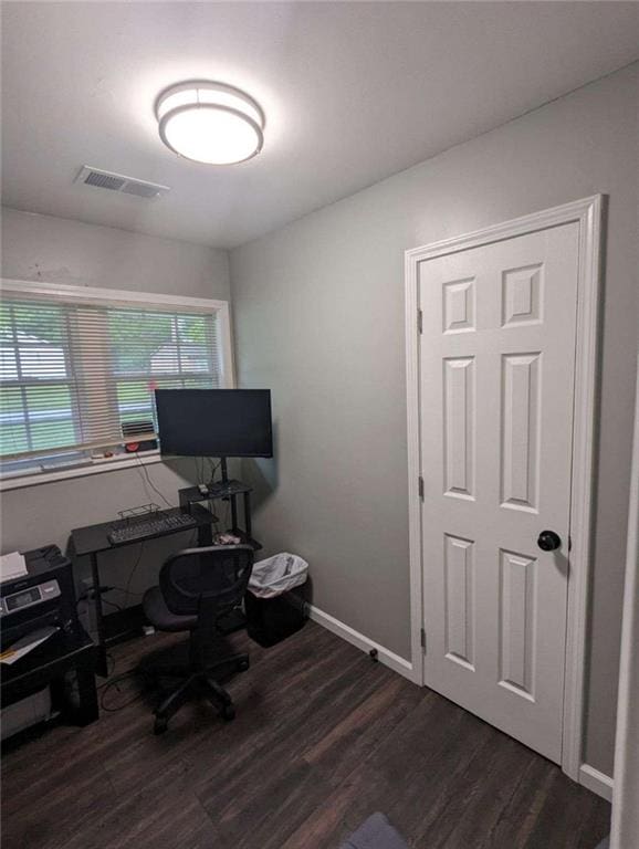 6977 Eunice Dr, Riverdale, GA 30274 - home office featuring dark wood-type flooring