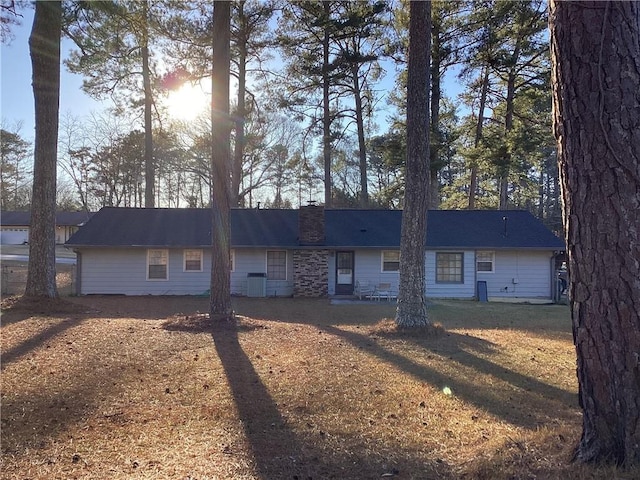 view of front of property featuring a chimney