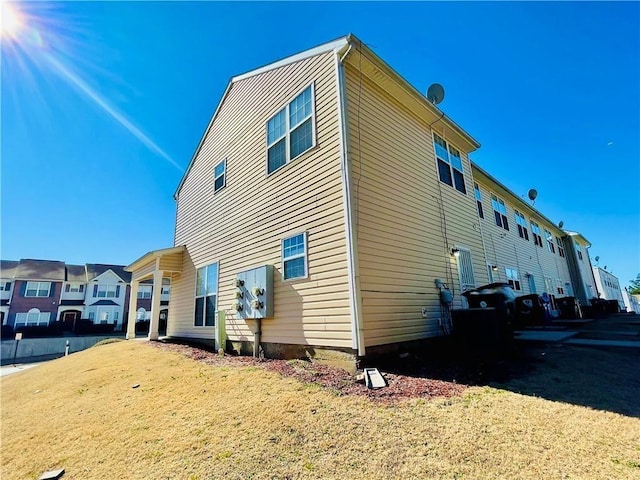 view of side of property with a residential view