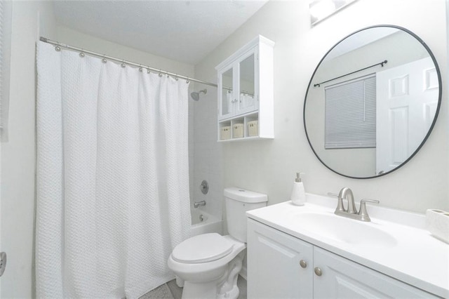 full bathroom with vanity, toilet, and shower / tub combo with curtain