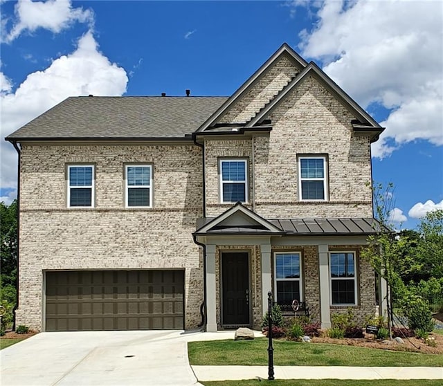 2962 Girard Ln, Duluth, GA 30097 - traditional-style home featuring an attached garage, concrete driveway, brick siding, a shingled roof, and a front lawn