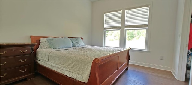 2962 Girard Ln, Duluth, GA 30097 - bedroom with baseboards and dark wood-type flooring