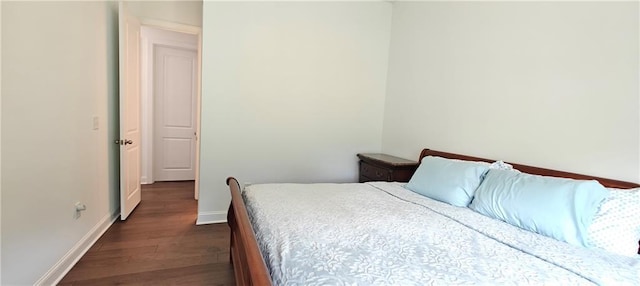 2962 Girard Ln, Duluth, GA 30097 - bedroom featuring dark wood-type flooring and baseboards