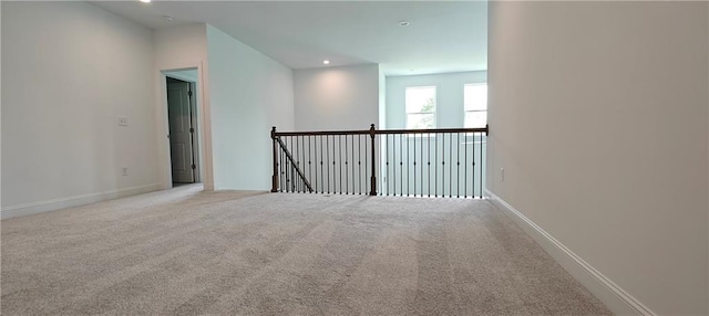 2962 Girard Ln, Duluth, GA 30097 - carpeted spare room with baseboards and recessed lighting