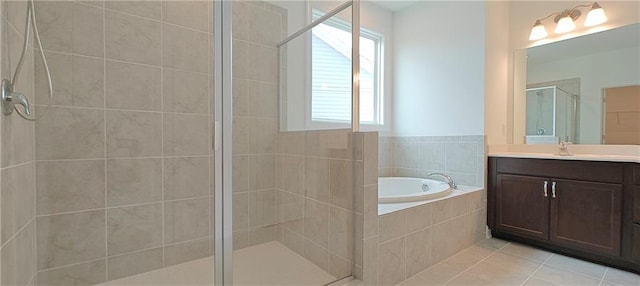 2962 Girard Ln, Duluth, GA 30097 - full bath featuring a shower stall, a garden tub, vanity, and tile patterned floors