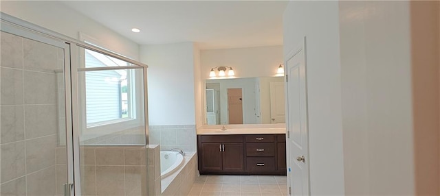 2962 Girard Ln, Duluth, GA 30097 - bathroom with a garden tub, a shower stall, healthy amount of natural light, and vanity