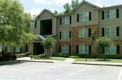 view of front of home with stone siding
