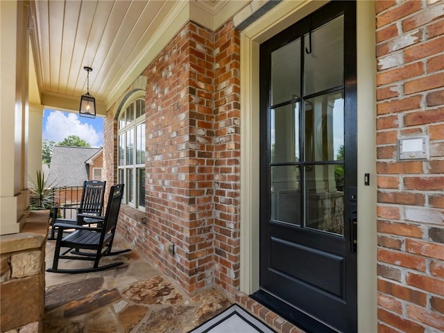 entrance to property with a porch