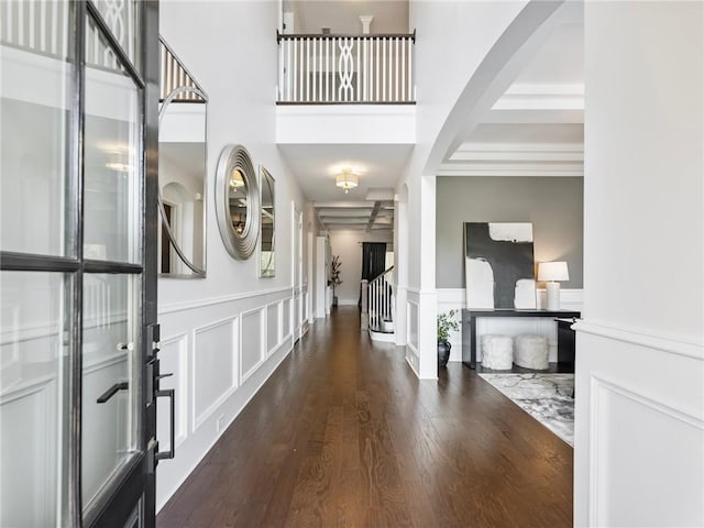 entrance foyer with dark hardwood / wood-style floors