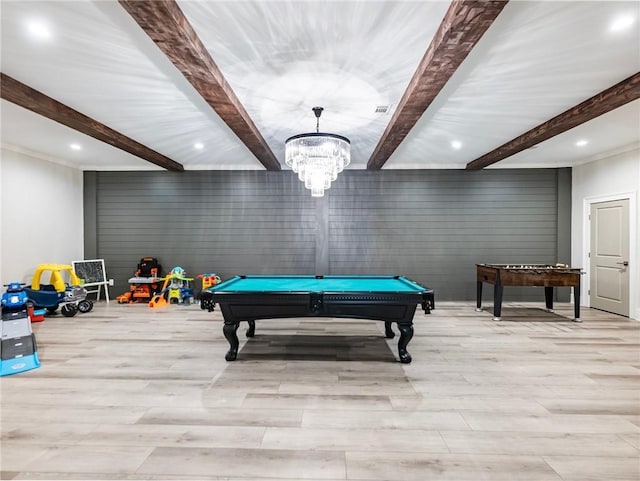 rec room featuring beam ceiling, light hardwood / wood-style floors, billiards, and an inviting chandelier