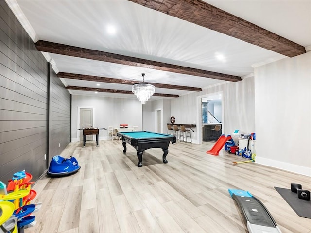 rec room featuring pool table, light hardwood / wood-style flooring, an inviting chandelier, and beam ceiling