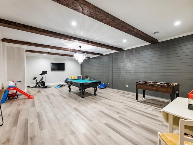 recreation room featuring pool table, a notable chandelier, light hardwood / wood-style floors, wooden walls, and beamed ceiling