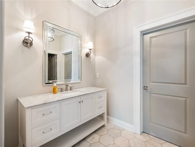 bathroom with tile patterned floors and vanity