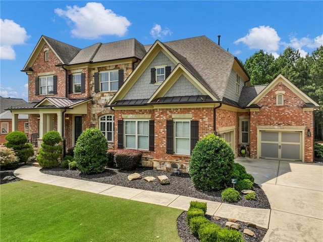 craftsman-style home featuring a front yard