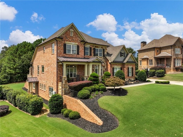 craftsman inspired home with a front yard