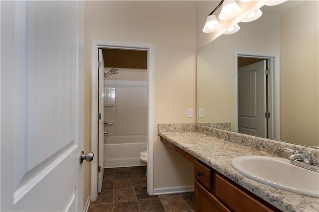 full bathroom with vanity, shower / bath combination, and toilet